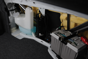 Radium FST mounted behind rear seat in Evo X trunk, Tuned By Shawn