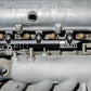 Radium BP 1.8L fuel rail with phenolic insulating washers, sold by Tuned By Shawn